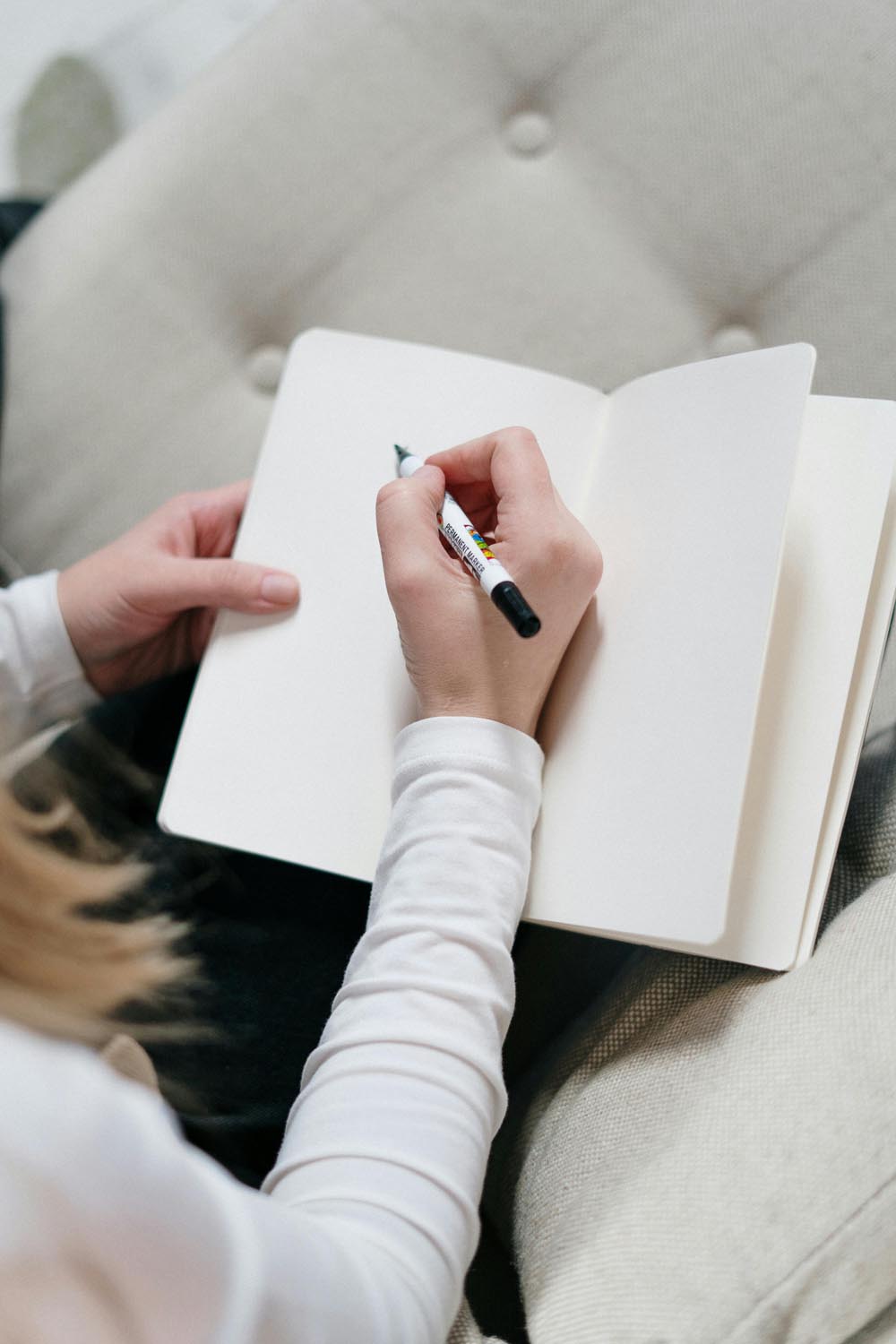End-of-life story telling. Person writing and journaling in Maryland and Washington, DC after psychology appointment.