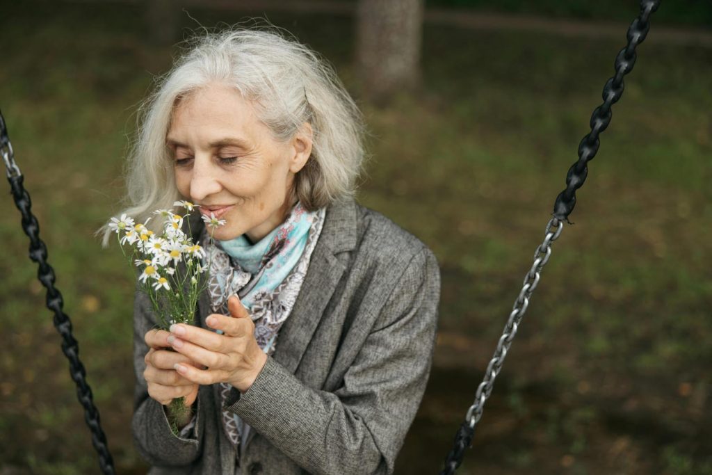 Photo of woman engaged in deep listening during a discussion about brain wiring and mediation with her family therapist as she's growing older.
